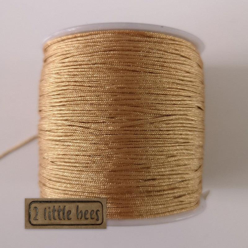 0.8mm Nylon Cord. Sandy brown - 2 little bees