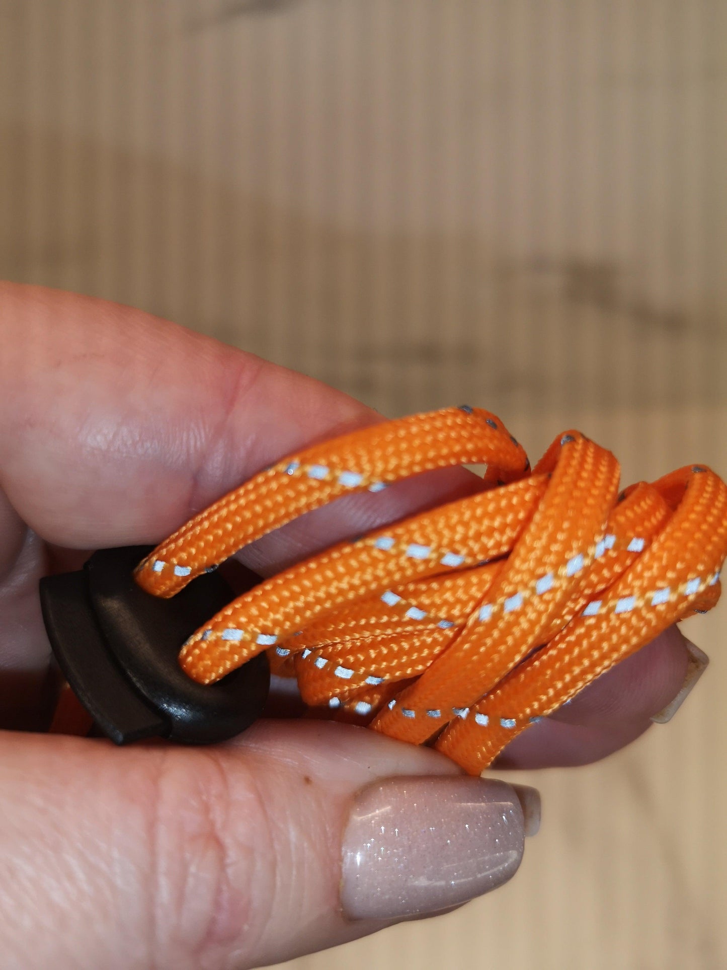 4mm orange reflective paracord. 7 Strand
