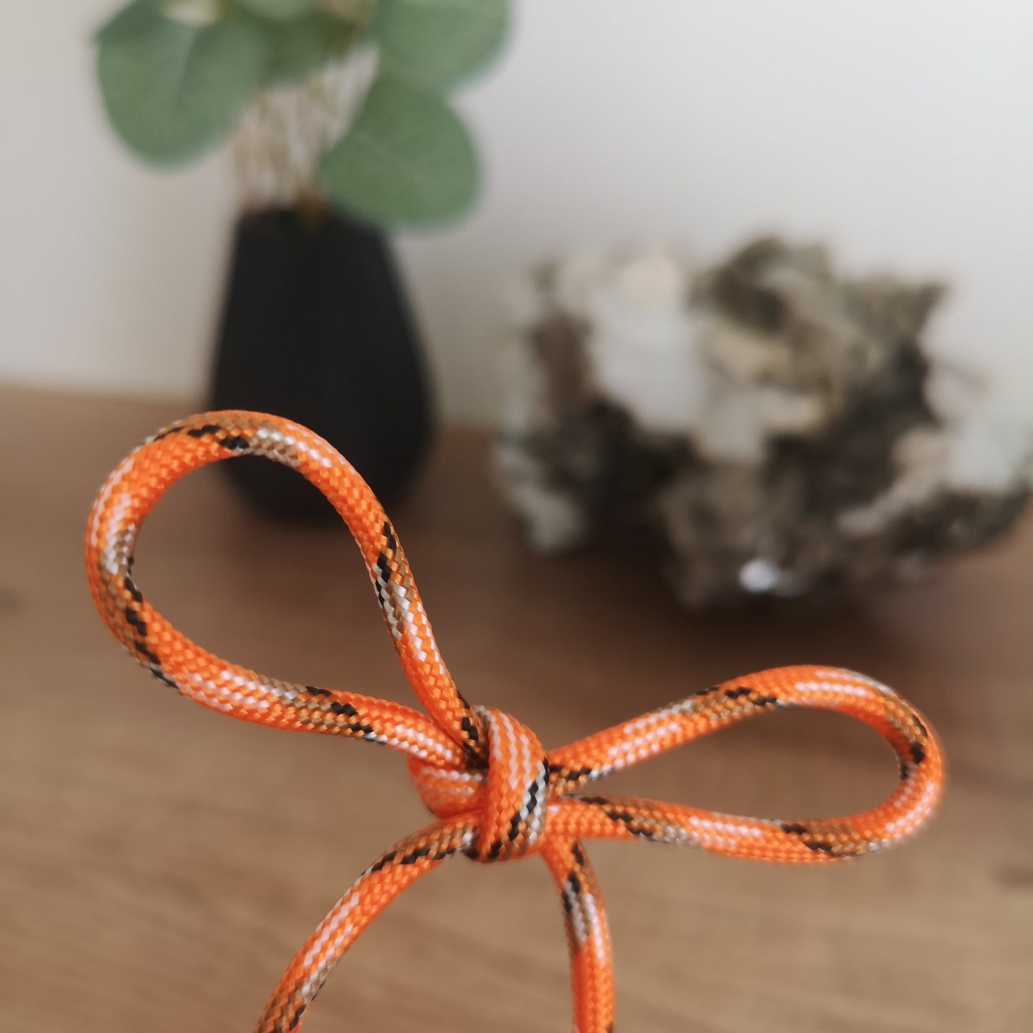 4mm orange/black paracord. 7 Strand