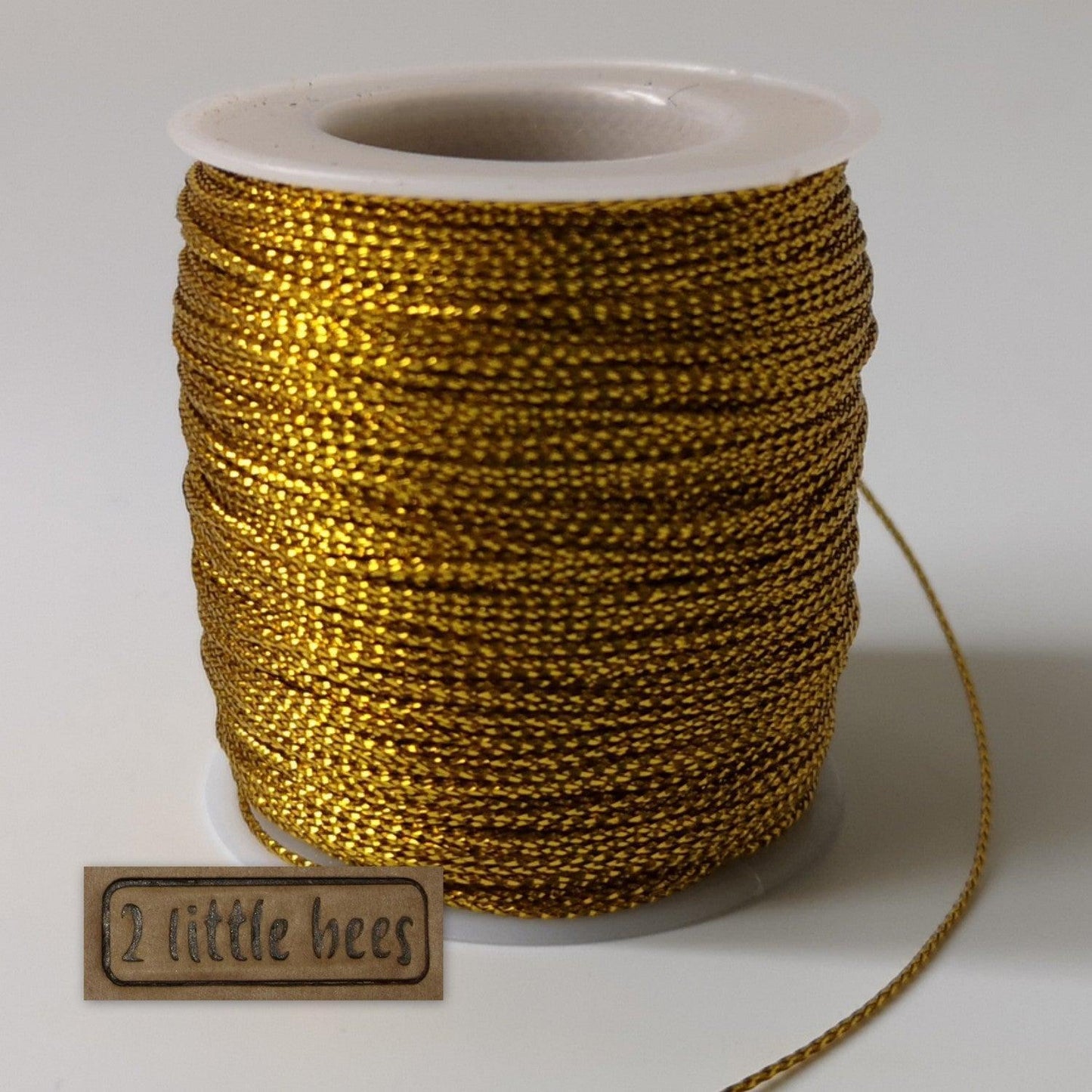 1mm metallic cord. - 2 little bees