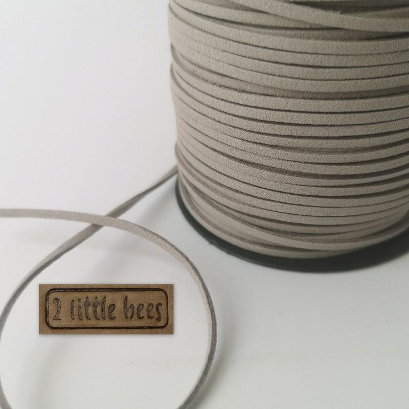 Grey flat string