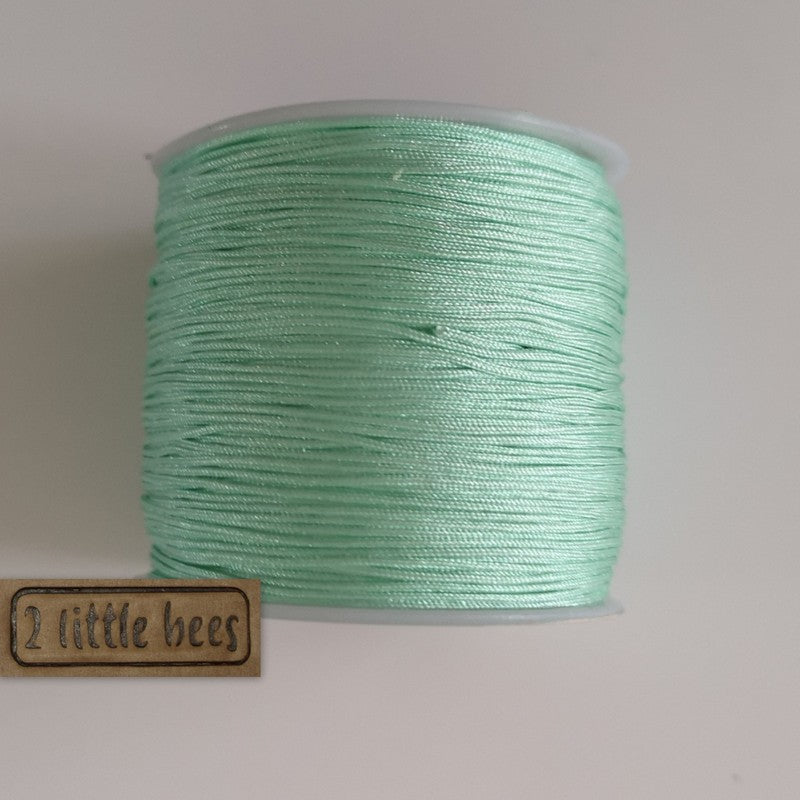 0.8mm Nylon Cord. Aquamarine - 2 little bees