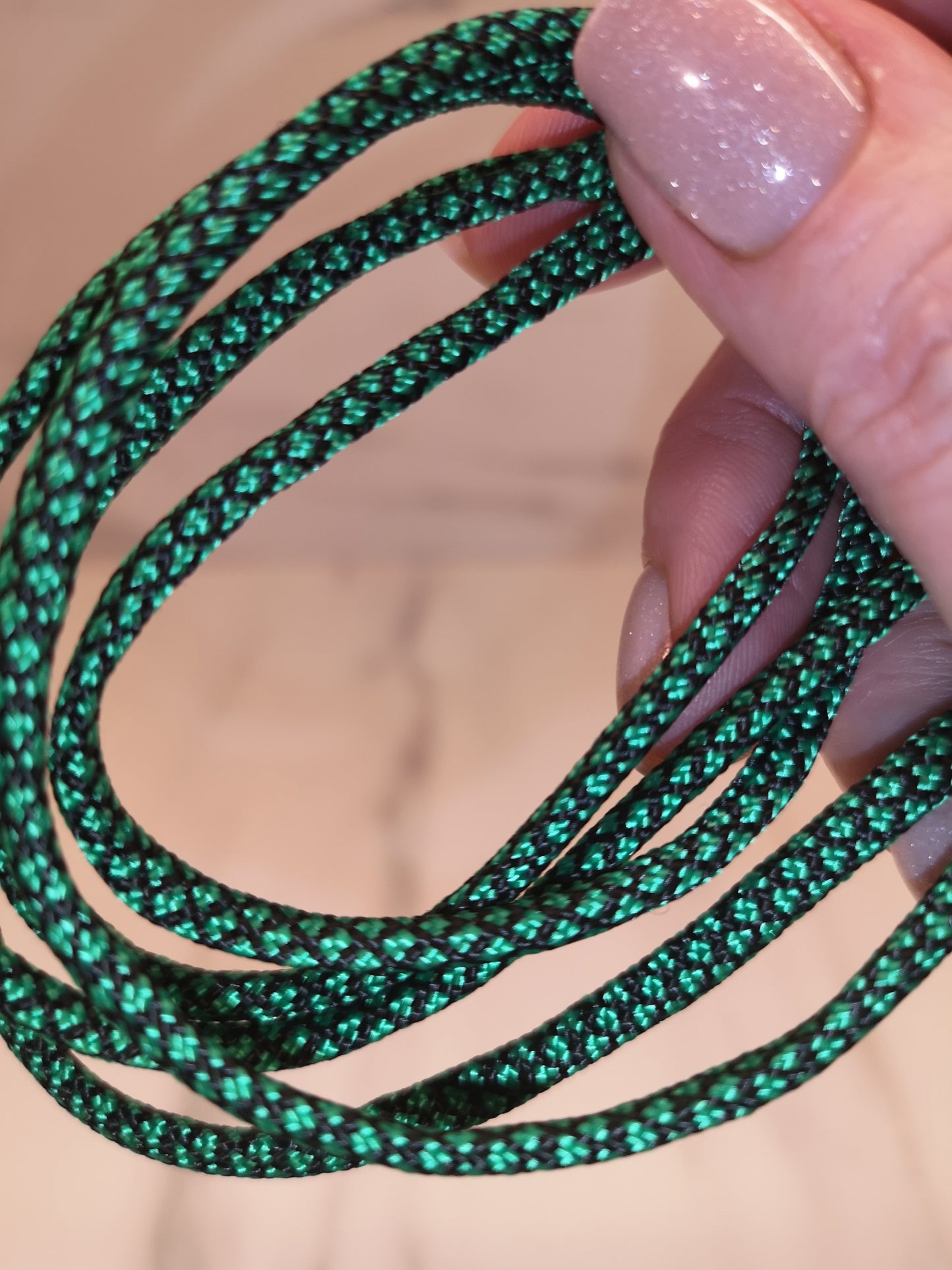 4mm green/black paracord. 7 Strand