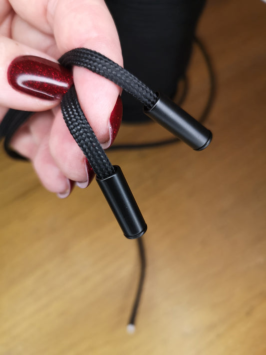 Black metal cord end
